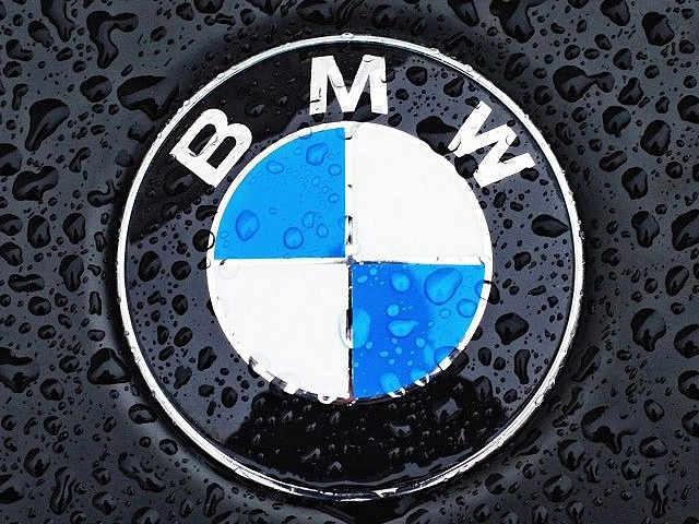 BMW logo drizzled with water