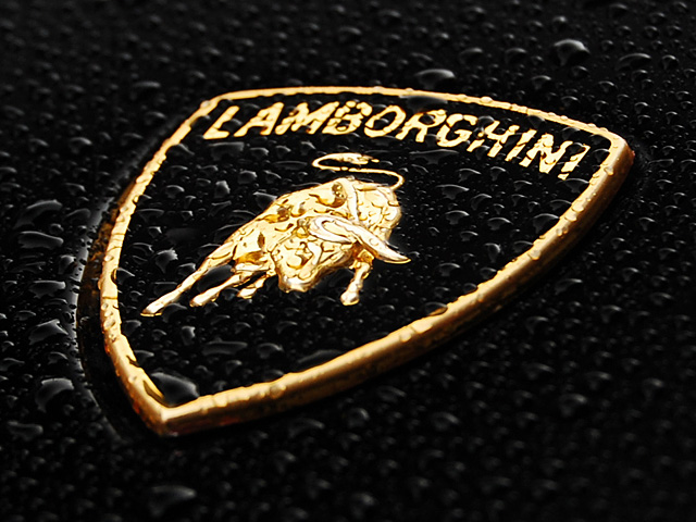 logo of sports and supercars brand, Lamborghini, with spray of waters