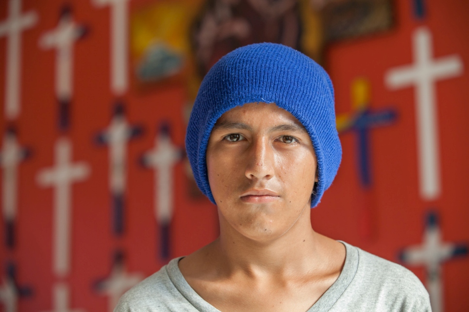 a mexican man wearing a bonnet