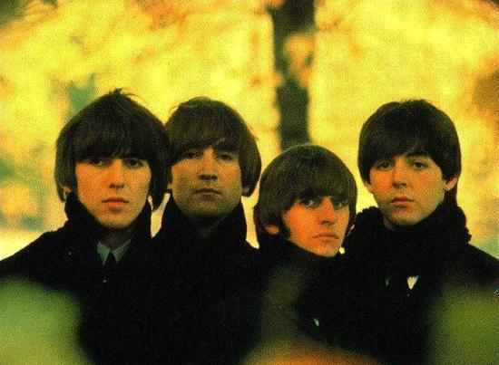 the beatles band wearing black clothes